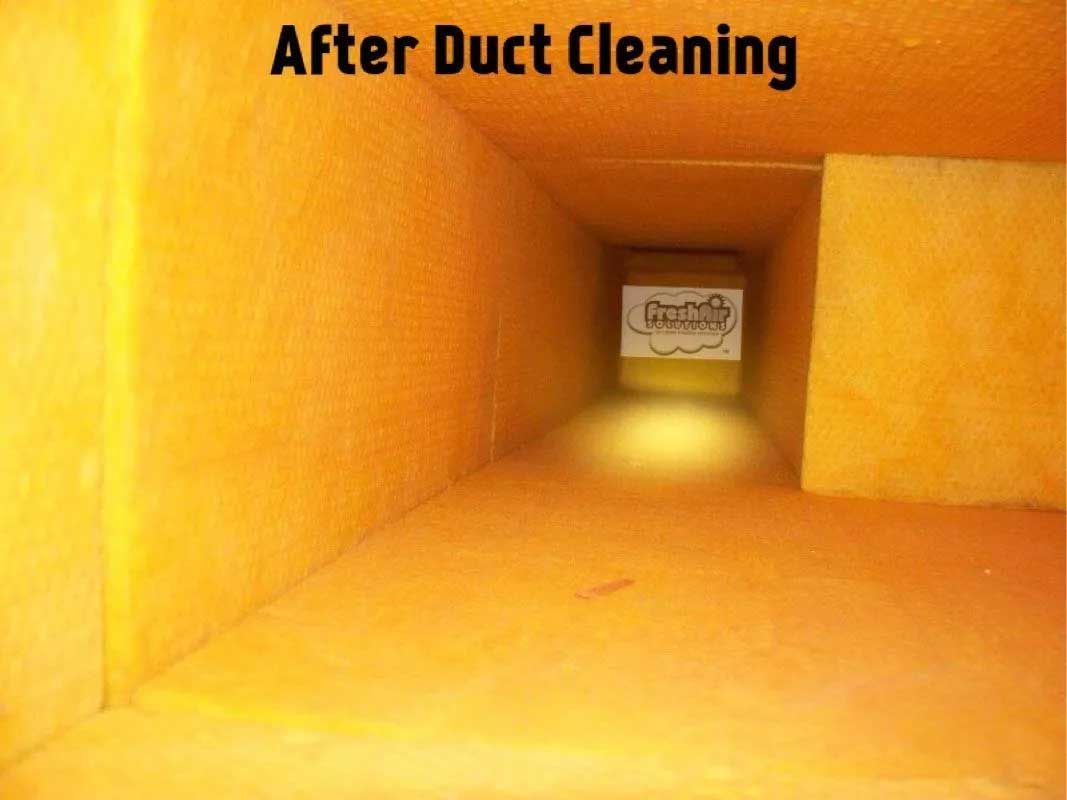 Dirty air duct interior before cleaning, coated in dust and debris.