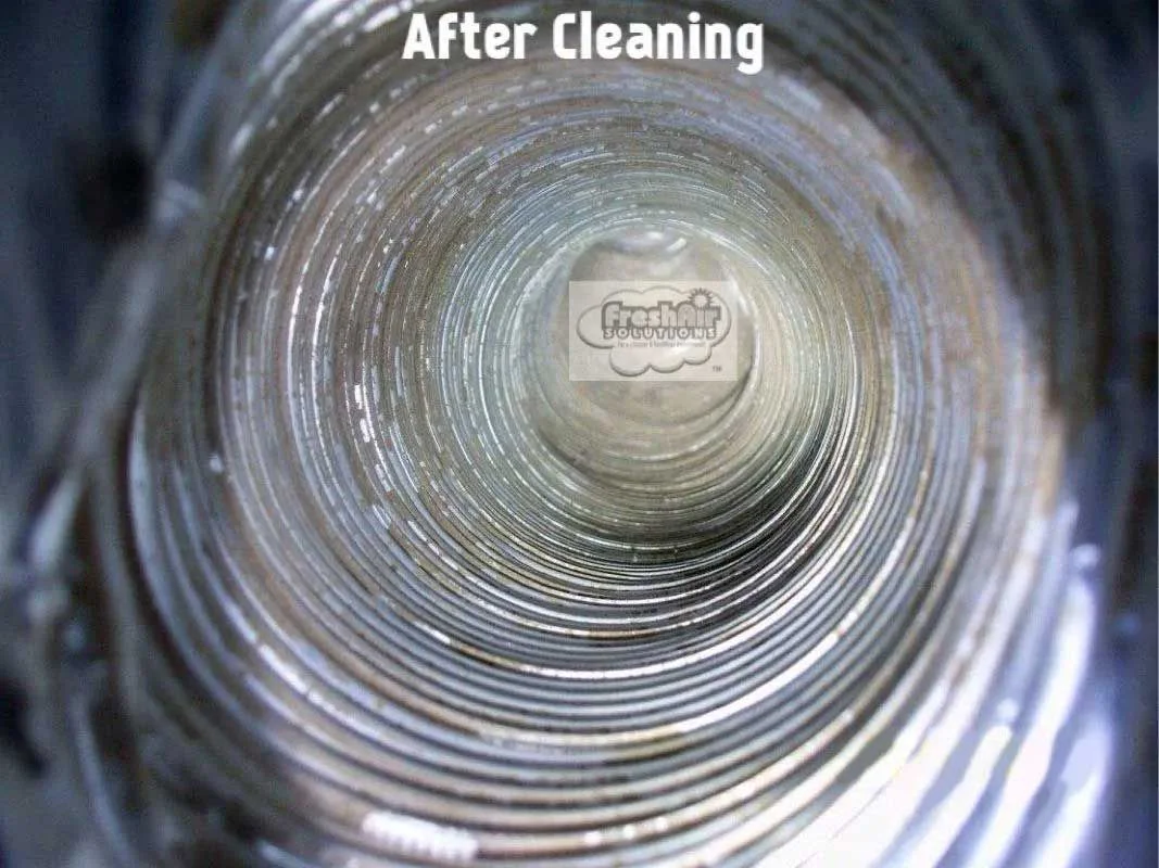 Dirty air duct interior before cleaning, filled with thick layers of dust and debris.